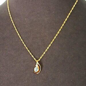 Gold Coloured Necklace with Blue Topaz Pendant
